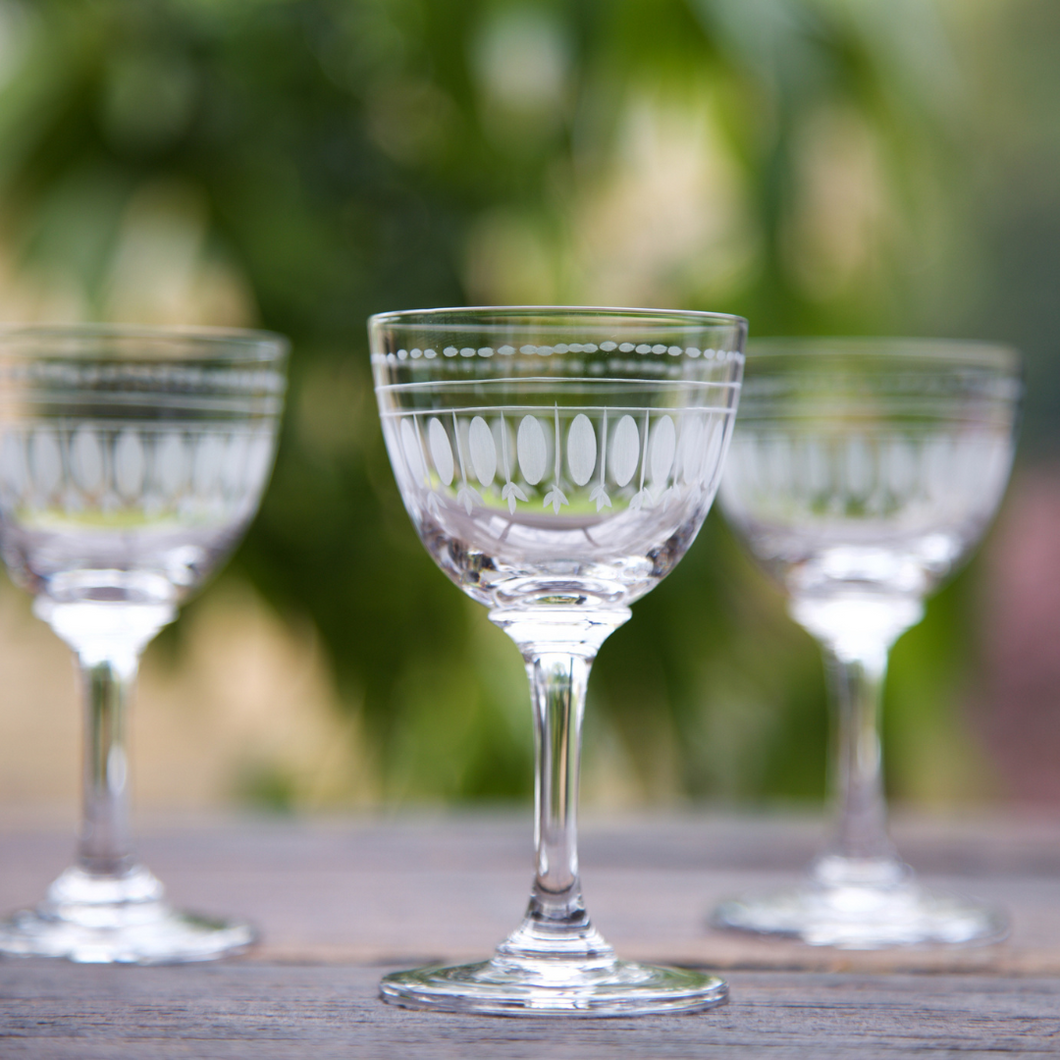 A set of size liqueur glasses from The Vintage List - all hand blown and hand engraved