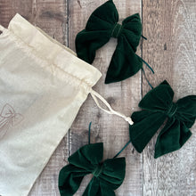 Load image into Gallery viewer, Three mini handmade bows in green velvet with a branded calico bag