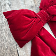 Load image into Gallery viewer, A close up of the padded head of this handmade bow in red claret velvet