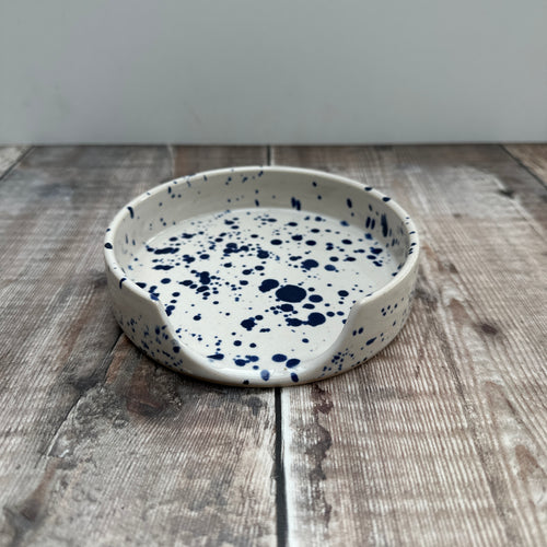 Handmade spoon rest on a wooden table