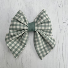 Load image into Gallery viewer, Green and white gingham bow on a light wooden background