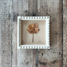 Load image into Gallery viewer, Framed dried flower arrangement on a wooden surface