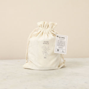 The canvas bag cover for the Jasmine and Vanilla Soy candle from Norfolk Natural Living