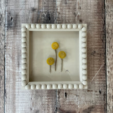 Load image into Gallery viewer, Decorative bobbin frame with yellow flowers sat on a wooden surface
