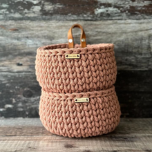 Load image into Gallery viewer, A pair of stacked handmade mini baskets in recycled cotton cord in a blush pink colour