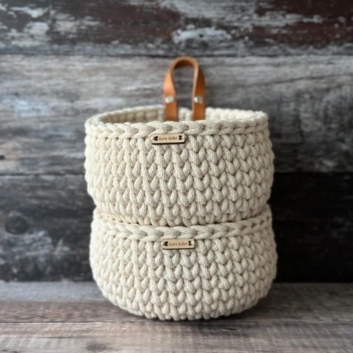a pair of stacked handmade mini baskets in natural recycled cotton cord