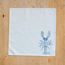 Load image into Gallery viewer, The super soft blue lobster napkin on a wooden table