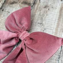 Load image into Gallery viewer, a close up of a handmade pink dusty bow on a wooden table

