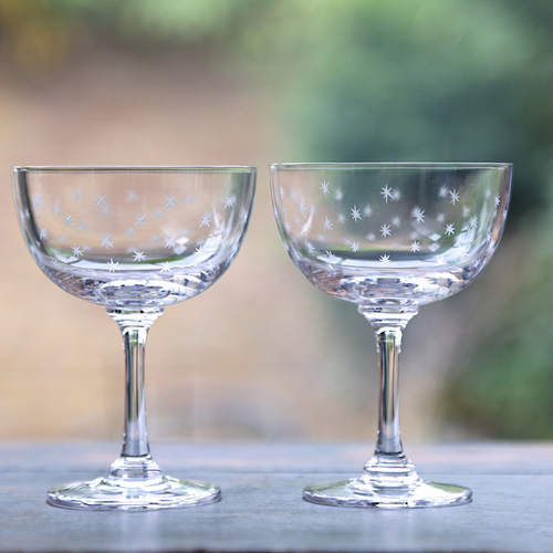 A pair of champagne saucers in Stars design from The Vintage list