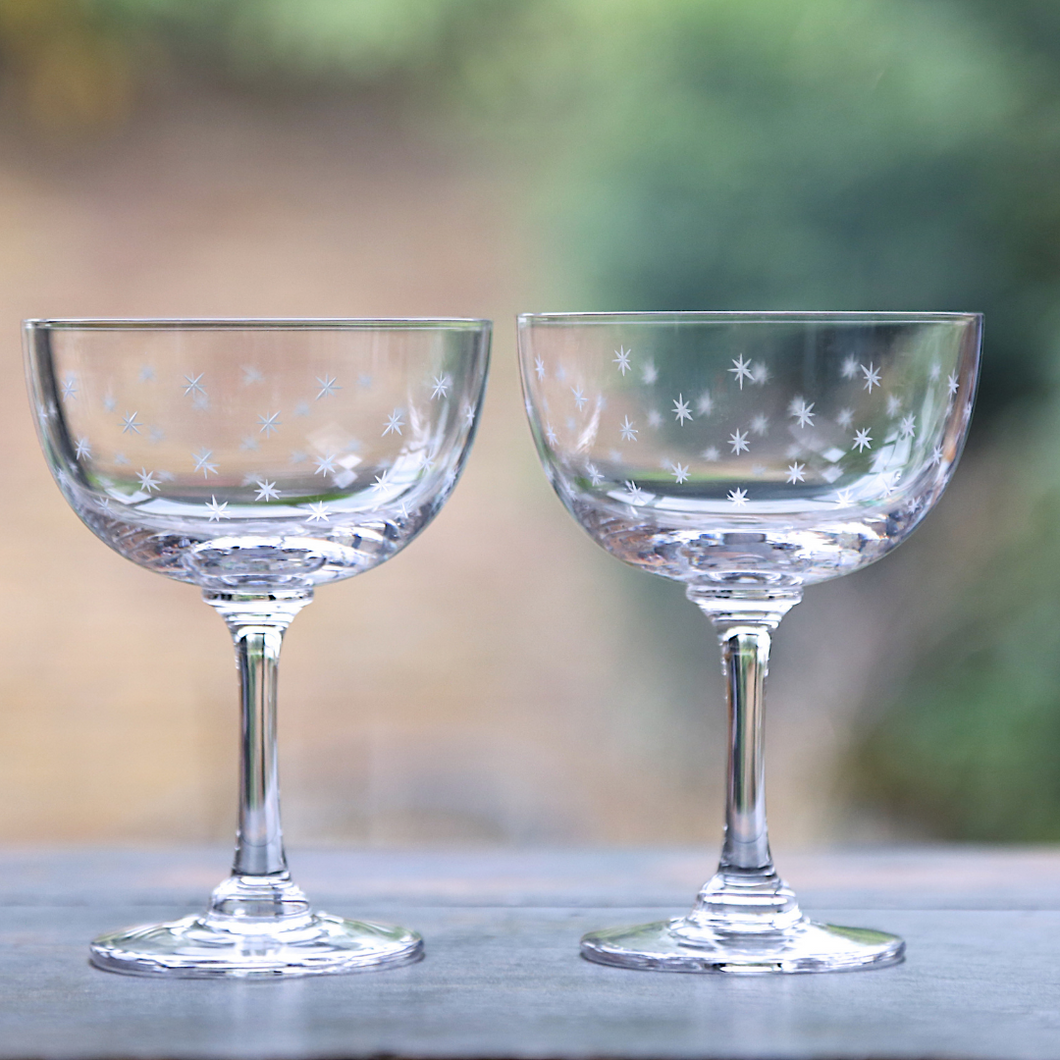 A pair of champagne saucers in Stars design from The Vintage list