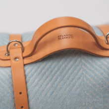 Load image into Gallery viewer, A close up image of the beautifully made leather carry strap which comes with every Atlantic Blanket sold by Rhubarb &amp; Hare