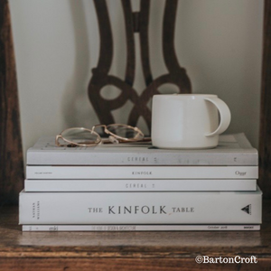 Picture of a large Barton Croft mug on a pile of stylish magazines