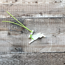 Load image into Gallery viewer, A Handmade ceramics running hare Easter decoration with fresh green satin ribbon