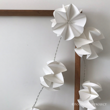 Load image into Gallery viewer, A string of 10 x fairy lights handmade with white paper flowers by Folded Side Project