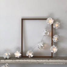 Load image into Gallery viewer, A string of 10 x fairy lights handmade with white paper flowers by Folded Side Project