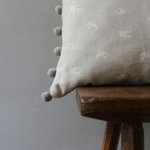 Load image into Gallery viewer, We are massive fans of the original linen fabrics designed and handmade by Olive &amp; Daisy on their vintage industrial sewing machines in their Lincolnshire workshop.   All designed and printed in the UK, this is a beautiful but versatile cushion in their Dove Grey Blotch Skylark fabric which would be perfectly at home in a modern or country setting. 