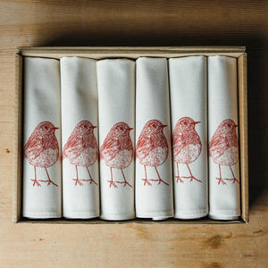 Hand Printed and handmade in the UK, the festive Robin Napkins from Lottie Day.  100% Natural Cotton