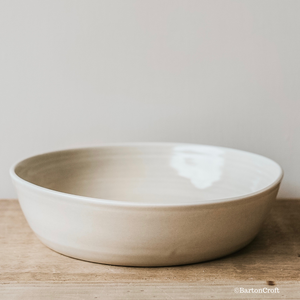 A stunning handmade serving bowl by Barton Croft in their rustic oatmeal glaze