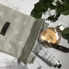 Load image into Gallery viewer, Handmade Olive &amp; Daisy luxury rolltop washbag with leather strap